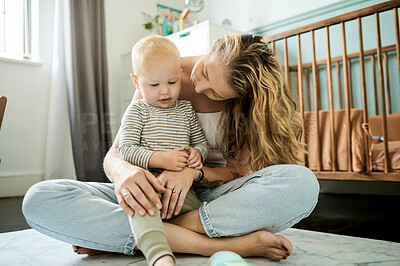 Buy stock photo Mother, child and together in family home for love, care and comfort in nursery or bedroom. Woman or mom and a toddler kid on floor carpet for quality time, conversation and bonding while happy
