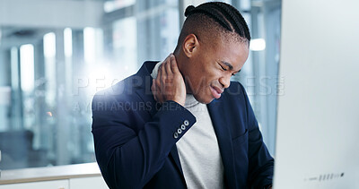 Buy stock photo Tired, businessman and neck pain in office with computer, burnout and stress for accounting deadline. Flare, black person and exhausted in firm with desktop, spine injury and crisis for finance job.