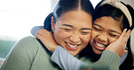 Girl, mother and hug in home with love, care and happiness for connection together with daughter. Kid, mom and embrace in living room for trust, support or excited parent with Asian family reunion
