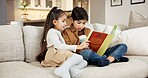Siblings, reading and children with book in home, education and cognitive growth with fiction story. Family, sister and brother with literature, literacy and kids with skill development in house