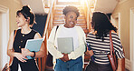 Women, students and walking at campus with smile, new semester and next class for college lecture. Happy, friends and laugh at university with books, orientation and academic discussion for education