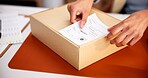 Person, hands and logistics with box label for courier instruction, address or schedule delivery. Distributor, supplier or dispatch sticker with parcel or package for shipping, post or online order