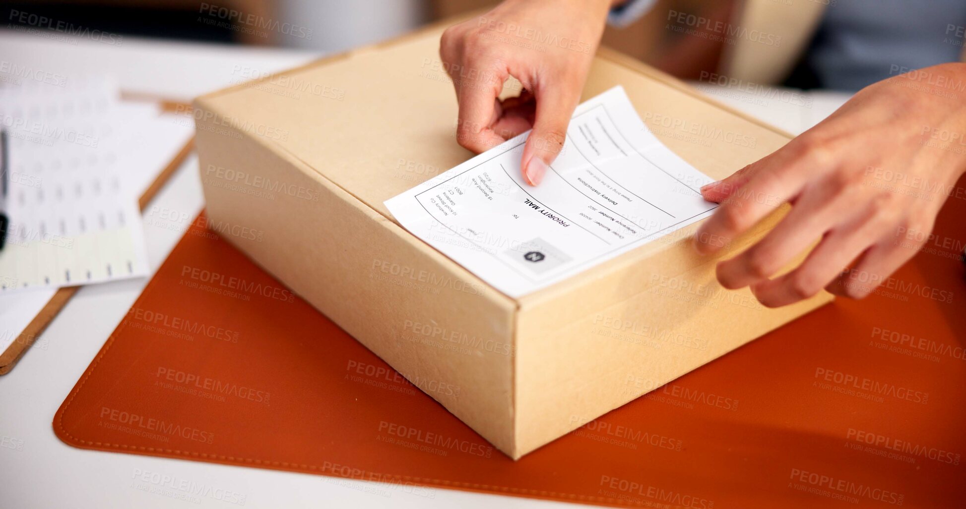 Buy stock photo Person, hands and logistics with box label for courier instruction, address or schedule delivery. Distributor, supplier or dispatch sticker with parcel or package for shipping, post or online order