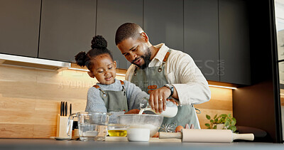 Buy stock photo Father, child and baking in kitchen with milk, teaching recipe and support with black family. Girl, parent and pour dairy for learning cooking in bowl, development and help with daughter at home
