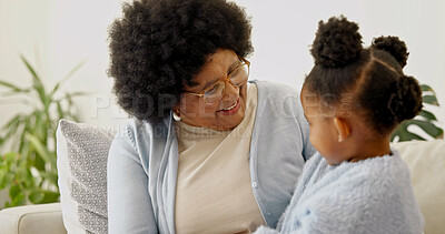 Buy stock photo Grandma, smile and bonding with child in home, love and laughing with granddaughter in living room. Family, connection and happy senior black person with girl, retirement and relax together in lounge