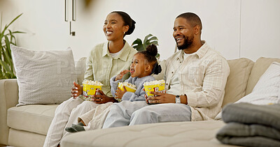 Buy stock photo Laugh, parents or child with popcorn for watching tv, movie entertainment or comedy show for bonding. Black family, girl and streaming subscription with snacks for funny film, unwind and happy home
