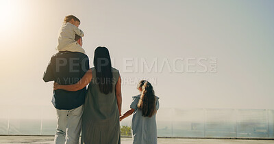 Buy stock photo Outdoor, back or parents with children for piggyback, bonding or support on summer vacation. Married couple, kids or holding hands at hotel for healthy family dynamic, travel holiday or balcony space