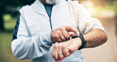Buy stock photo Senior, hands and checking time with watch in park for outdoor fitness or tracking performance. Elderly, male person or wristwatch with heart rate for monitoring cardio, health or wellness in nature