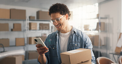 Buy stock photo Ecommerce, man and phone in office with package, logistics and track online order on courier website. Happy, person and boxes with tech, supply chain and mobile app for reading distribution update.