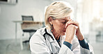 Doctor, woman and healthcare stress in clinic for patient decline, treatment fail and shift pressure. Crisis, mature expert or overwhelmed in hospital for terminal news, compassion fatigue or anxiety