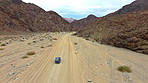 Making tracks through the desert canyons