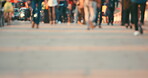 Blurred crowd of people in a busy city