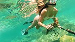 Woman swimming in the ocean