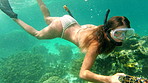 Woman swimming in the ocean