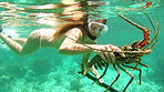 Woman swimming in the ocean