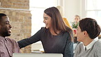 A group of businesspeople brainstorming during a meeting. A diverse group of corporate businesspeople planning during a meeting, talking and laughing. A group of happy businesspeople talking