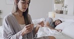 Young mixed race woman looking stressed about an unplanned pregnancy. Hispanic couple with fertility problems unhappy about a negative pregnancy test result. Young expecting mother waiting for result