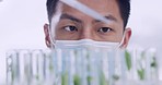 Closeup of laboratory scientist using dropper or pipette to test plants and leaves in test tubes. Botanist checking for chemical reactions during plant genetic research. Experimenting with solution