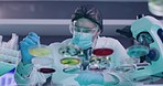 Laboratory scientist testing monkeypox chemical reactions in petri dishes on glass table for medical research. Biochemist using dropper or pipette with multiple samples. Searching for infections cure