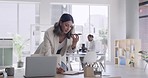 Business woman talking on a phone and writing notes. Creative designer and manager using loudspeaker on technology to network with a client or negotiate a deal. Arranging an employee review meeting