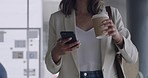 A confident business woman arriving at the office with copy space. A corporate female walking and sending a message on her phone and drinking coffee. Businesswoman  browsing her social media 