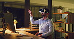 Business man wearing VR headset to connect and interact in a metaverse with a digital user interface in an office at night. Entrepreneur in an immersive virtual world with AI and 3D simulations