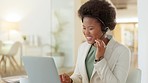 Young business woman talking on a conference video call via laptop webcam during a virtual meeting. Female call center agent using a headset while consulting for customer service and sales support