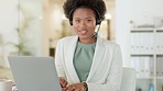 Portrait of a friendly call center agent using a headset while consulting for customer service and sales support. Young business woman with a big smile working on a laptop while operating a helpdesk