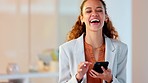 Happy business woman texting on a phone in an office. One confident and cheerful young corporate executive laughing and smiling while networking with clients and reading messages with good news