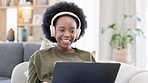 African woman using laptop and headphones while waving hello during a video call with friends. Student talking to her teacher and learning new language online during online course or private lesson
