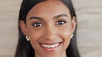 Closeup portrait of a cheerful, happy and confident woman with a positive attitude smiling with joy. Face of a beautiful latino female with a beautiful smile feeling excited and in a good mood