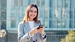 Portrait of a female reporter checking a phone outside looking happy in the city. Face of a stylish young woman journalist or writer browsing online or posting on social media standing alone