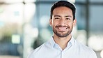 Portrait of a confident businessman smiling at laughing while looking at the camera. Face of ambitious entrepreneur feeling happy and positive. Funny man enjoying office job in accounting department