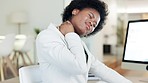 Woman suffering with neck pain in an office. Stressed female rubbing her stiff muscles and sore body while feeling strain, discomfort and hurt from bad sitting posture and long working hours at desk