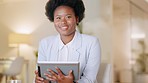 Business woman browsing on digital tablet and using online technology software to monitor staff performance and business projects. Portrait of confident, afro professional executive manager in office