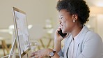 Confirming an online order with a client through a website made easy with good communication. An African American business woman on a phone call talking about a project plan and suggesting a solution