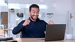 Happy database administrator celebrating his goal of protecting the management data system from defect. Performance analyst celebrates meeting a deadline target with a fist pump in his office at work
