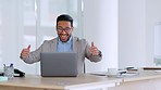 Cheerful businessman reading email on laptop and celebrating his success and good news after a successful online deal. Male attorney or lawyer feeling happy and overjoyed after winning legal case