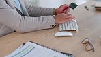 Financial trader typing credit card details on computer keyboard for ebanking, investing and trading on stock market in office. Closeup of professional finance advisor checking profit amounts in bank