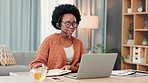 Talking, advice and feedback provided by a call center agent while doing telework and working from home on a laptop. Happy and cheerful black female customer service worker in a virtual meeting