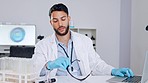 Tired, exhausted and stressed scientist working long hours on virus research at a science lab. A male medical professional with burnout, stretching strained backache muscles from sitting at a desk