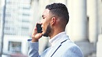 Stylish and successful business man talking on call while waiting and looking around outside alone in the city. Young entrepreneur, investor or startup owner chatting on phone before meeting a client