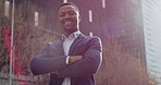 Confident, proud and happy entrepreneur standing with arms crossed in city while satisfied with new leadership career opportunity. Professional black businessman and leader of a successful company