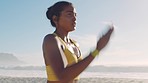Active, sporty and athletic woman running, training and doing cardio on the beach during summer. Closeup fit, energetic and fast female athlete, doing a workout, exercising and jogging at the sea