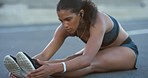 Breathing runner stretching legs before running for fitness training, competition or marathon in the street or road. Athlete woman doing cardio workout exercise for motivation and healthy body 