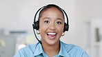 Call center agent answering an online call and consulting via videocall while sitting in an office. Female customer service representative or helpdesk operator talking during a virtual sales meeting