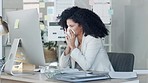 Sick business woman looking unwell while blowing her nose and working in an office. Female suffering with sinus, allergies or corona symptoms. Lady with a bad cold or flu sneezing at work 