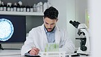 Biochemistry, research and innovation in a modern lab with a handsome scientist working with medical samples. Happy health care professional smiling while searching for a cure for cancer or corona