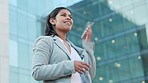 Businesswoman talking, chatting and holding phone while looking confident and happy outside a modern building copy space and background. One trendy corporate worker having a good online conversation