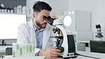 Innovation, science and medical breakthrough in a lab with a confident scientist. Portrait of a handsome health care professional conducting experiments with a microscope, cure or treatment discovery